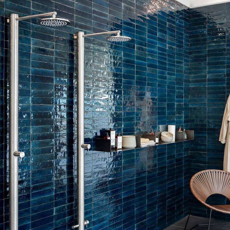 Magnolia Distressed Subway Tile Blue 2.5x9.5 installed in a shower wall